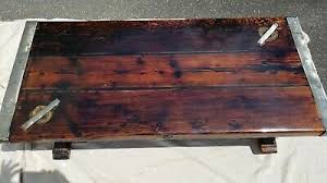 You get to pick the color stain you want, the type of finish and the metal components, kime says, noting that these customizations are included in the base price. Ships Hatch Coffee Table