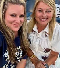 It was 110 outside and we were there from 4 until 9 but my heart was so  happy to be at Wolverine pride and watch 3rd graders up to varsity play  football