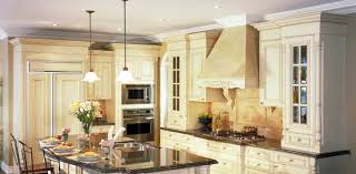 By simply using some wood and molding to bring the cabinets to the ceiling, we changed the look of the entire room! Installing Crown Molding On Kitchen Cabinets