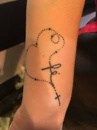 Duet of rosary and baseball tattoo. 100 Rosary Tattoos Ideas Rosary Bead Tattoo Tattoos Rosary Tattoo On Hand