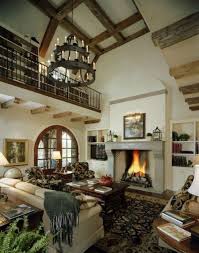 This Beautiful California Rustic Spanish Style Living Room Boasts A Fireplace Wrought Iron Mediterranean Living Rooms Spanish Interior Design Spanish Interior