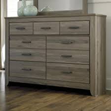 Shop our best selection of 7 drawers dressers & chests to reflect your style and inspire your home. Ashley Signature Design Zelen B248 31 Rustic Tall Dresser With 7 Drawers Dunk Bright Furniture Dressers
