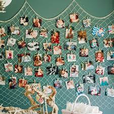 Diy tutorial on how to create your very own clothespin string picture frame for art and photo display. Clothespin Photo Hanger Fishing Net Wall Decor Multi Pictures Organizer Fishing Net Wall Decor Picture Hanging Graduation Photo Displays