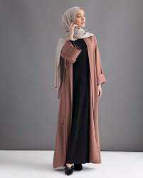 A long, flowing garment that covers the whole body from head to feet, the burka. New Arabic Burqa Designs Promotions