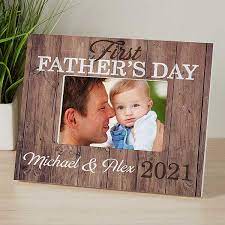 Show him he's a star as he embraces his new role as daddy with this adorable wood picture frame that reads first father's day and daddy & me. Personalized Rustic Picture Frame First Father S Day