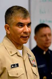 Master Chief Petty Officer of the Navy (MCPON) Joe R. Campa Jr. talks with  Officer Candidate School students during breakfast at the United States  Coast Guard Academy.