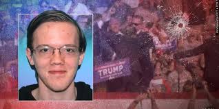 Rally shooter had photos of Trump, Biden and other US officials