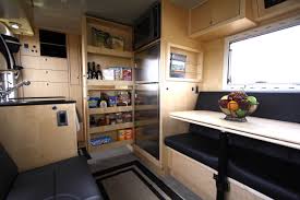 Earthroamer—a global leader in expedition vehicle design, manufacturing and engineering—will celebrate its 20th anniversary this year. Earthroamer Interior White Wash Finish Camping Supplies Motorhome Spacious Kitchens