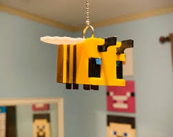 Show your love for minecraft with this amazing led lamp that will look great in a bedroom, gaming den, or man cave. Minecraft Bee Etsy