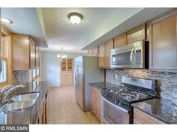 galley kitchen in remodeled 1950s