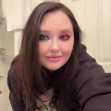 Kitten update! The girls carry them around swaddled up like they're babies  🤣 Joey our other cat isn't so sure about them…he won't attack them bc he's  the sweetest guy but starts