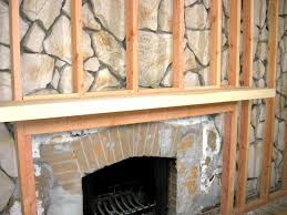 Cy had to get pretty creative to cy started the project by building a frame above the mantle ledge to create a flat surface between the i really love a brick or stone fireplace, yet what you've accomplished is pure beauty! How To Build A Standard Wall Over A Stone Wall Stone Fireplace Mantles Stone Fireplace Makeover Stone Fireplace Wall