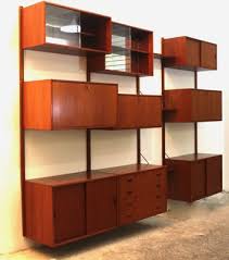 To design or purchase a custom cabinet, call us at 800.301.9720 or email shop@roomandboard.com. Danish Modular Teak Wall Unit By Poul Cadovius 1960s For Sale At Pamono