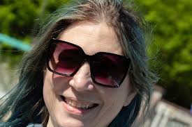 Memorial day lawnmower parade with hockey family