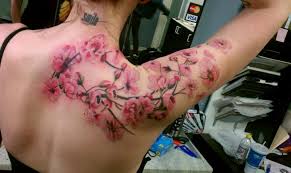 Sakura or japanese cherry blossom tree tattoo means not only purity and innocence but also grief, terrible suffering, and injustice. Nice Cherry Blossom Tree Tattoo On Shoulder Tattooimages Biz