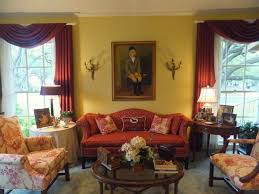 Recreate this look by going for a deeper gray on walls and furniture that can hold it's own against the bright pink, blue, and yellow. Living Room Burgundy And Gold Curtains Novocom Top