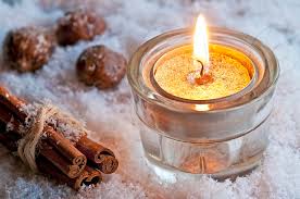 Tea Candle Light And Cinnamon Sticks In Snow By Jochen Schneider Photo Stock Snapwire