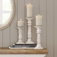 Cheaper than most yet the fragrances and burn time are really good. Amazon Com Barnyard Designs Rustic Pillar Candle Holder Stands Tall Wood Candlestick Centerpieces For Table Or Living Room Decor White Set Of 3 14 11 5 And 9 Tall Kitchen Dining