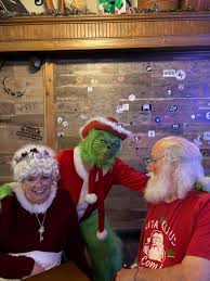 Santa trying to convince the Grinch...