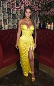 Here are 20 photos of kim kardashian's giant behind out and about, and in and out of clothes. Kim Kardashian West Explains Her Recent Obsession With 90s Versace And Cher Vogue