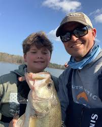 Yesterday was “Job Shadow Day” at school so Troy and I had to put in a hard  day's work at the office (aka Clark's Hill). @caymasfreshwater  @simmsfishing @lews_fishing @mercurymarine @costasunglasses @power.pole  @lowrancefishing @