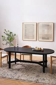 French vintage brass pipe shelves are fixed to a black and white marble pantry countertop. Amber Lewis For Anthropologie Henderson Dining Table Anthropologie