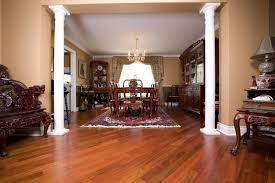 Taupe wall with cherry cabinets. Imported Exotic Hardwood Flooring Pinnacle Floors