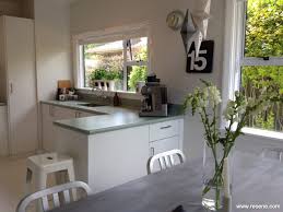 A versatile white with a hint of grey, best used with muted rather than bright colours. A Colour Scheme Of White With Black And Grey Accents For A Kitchen