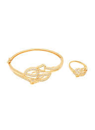 The spruce / sarah lee all that glitters is not gold—at least not solid gold. Florence Collection 2 Piece 18k Gold Plating Bangle Bracelet And Ring Set For Women With Cubic Stones And Leaf Design Gold Dubaistore Com Dubai