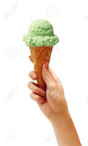 Three vanilla, two chocolate, one pistachio ice cream cone. Woman S Hand Holding Wafer Cone With Pistachio Ice Cream Close Stock Photo Picture And Royalty Free Image Image 56338307