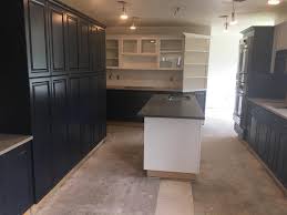 Handy base kitchen cabinet with adjustable top shelf for utensil organization and bonus lower shelf for dry goods storage. Blue Hale Navy And Cloud White Cabinets Painting Guys