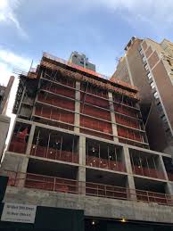 H noir wood closet system corner tower. 30 West 39th Street Rises Past Podium Setback In Midtown New York Yimby