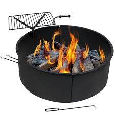 Its unique features include a cooking grate for convenient grilling, a mesh screen for safety and a poker. Sunnydaze Decor 36 In Round Steel Wood Burning Fire Pit Kit With Rotating Cooking Grate Kf Scfr36 The Home Depot