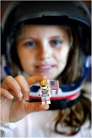 Chloe Spencer (9) looks forward the opening of the National Museum of  Flight's Brick History LEGO