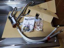 This is a single handle adapter which helps to secure the handle. Diy 2 Setting Up Single Handle Kitchen Faucet The Wadas On Duty