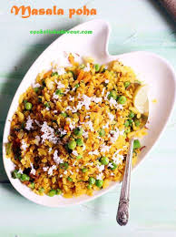 Masala Poha Recipe A White Plate Containing Poha Or Rice Flake With Indian Spices Poha Recipe Cooking Recipes Recipes
