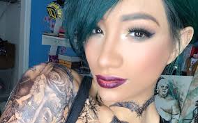 While waiting in a line (those happen at conventions in case you didn't know), i noticed the person behind me had a tardis tattoo. Sasha Banks Shows Off New Tattooed Look