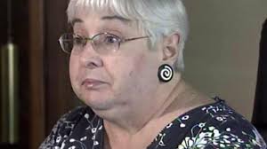 Woman denies taking bribes to issue questionable vehicle titles