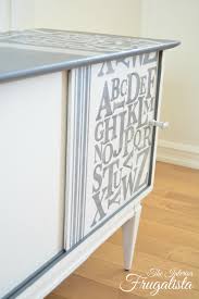 Beautiful walnut radio / record player cabinet restored and repurposed. Mid Century Modern Record Cabinet Makeover Interior Frugalista