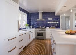 Pair it with marble and shades of white. Bridgeport Yellow And Blue Kitchen Ideas Beach Style Kitchen With Range Hood Holly Floor