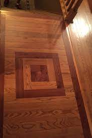 An irregular transition of natural wood flooring and kitchen floor tiles (peter a. About Transition Flooring Concepts
