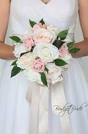 This is a great bouquet for a more traditional wedding. Simple Blush Pink And White Brides Wedding Bouquet With Greenery Foliage Small Bridal Bouquets Simple Wedding Bouquets Bridesmaid Boquets