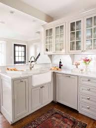 Transitional Kitchen With Gray Cabinets And Farmhouse Sink Home Kitchens Kitchen Renovation Light Grey Kitchens