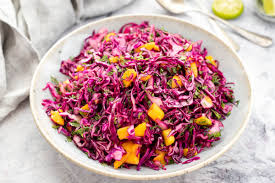 Maybe you would like to learn more about one of these? Red Cabbage Mango Slaw With Cilantro And Lime Recipe Elle Republic