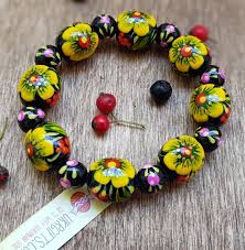 In 2013 it was included to the unesco representative list of the intangible cultural heritage of humanity. Holz Armband Mit Blumenmuster Handgefertigt Ukrainische Petrykiwka Malerei Damenschmuck