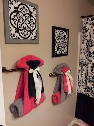 A handy bar below holds hand towels. Ideas For Organizing The Bathroom