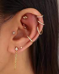 cartilage hoop helix ring rook piercing tragus earring conch jewellery cartilage jewelry crystal in silver rose gold gold in 2021 rook piercing jewelry pretty ear piercings earings piercings