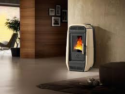 The Subtly Elegant Ambra Pellet Stove Carries A Clear Hint Of Modern Creativity With Its Striking Asymmetric Body Small Stove Pellet Stove Modern Tiny House
