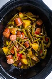 It's a food that pleases even the pickiest of eaters, it's fairly inexpensive and it's easy to cook. Slow Cooker Kielbasa And Green Beans Brooklyn Farm Girl