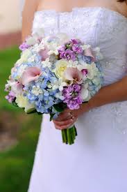 Soft And Feminine Bouquet In White Ivory Light Blue Mauve Pink And Lavender Roses Calla Lilies Blue Wedding Bouquet Blue Wedding Flowers Wedding Bouquets